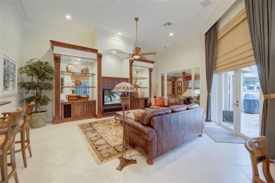 Discover this exquisite 4-bed 3.5-bath w/office & den pool home on Weston Hills Country Club in Florida - for sale on GolfHomes.com, golf home, golf lot