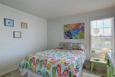 Built in 2021, this beautiful and spacious 2-bedroom, 2-bath on Barefoot Bay Golf Course in Florida - for sale on GolfHomes.com, golf home, golf lot