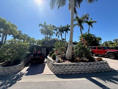 Golfer's Paradise with Unmatched Views and Upgraded Outdoor on Motorcoach Resort Golf Course in Florida - for sale on GolfHomes.com, golf home, golf lot