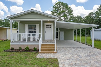 **Make This Charming NEW Home Yours & Golf FREE for 1 Year** on Rolling Greens Executive Golf Community in Florida - for sale on GolfHomes.com, golf home, golf lot