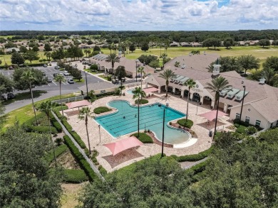 Enjoy the good life with golf course views in this 3-bedroom on Summerglen Country Club in Florida - for sale on GolfHomes.com, golf home, golf lot