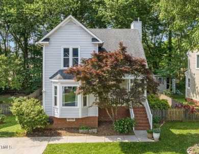 This adorable, flower-filled Hedingham cottage is waiting to be on Hedingham Golf and Athletic Club in North Carolina - for sale on GolfHomes.com, golf home, golf lot