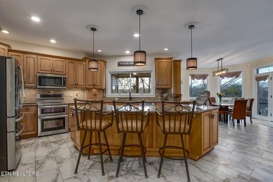 CAPTIVATING VIEWS of Tellico Lake from the Foyer draw you into on Toqua Golf Course - Loudon County in Tennessee - for sale on GolfHomes.com, golf home, golf lot