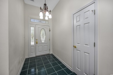 Discover the perfect family retreat in this spacious, one-level on Tidewater Golf Club and Plantation in South Carolina - for sale on GolfHomes.com, golf home, golf lot