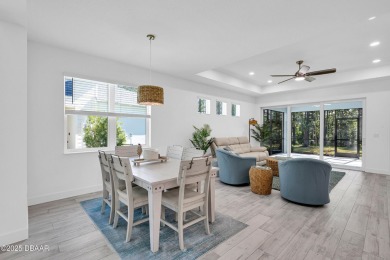 Embrace paradise in this like new Lucia Villa & start living on LPGA International Golf Course in Florida - for sale on GolfHomes.com, golf home, golf lot