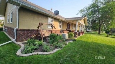 This beautifully updated home includes 5 bedrooms, 3 bathrooms on Miles City Town and Country Club in Montana - for sale on GolfHomes.com, golf home, golf lot