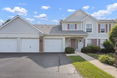This lovely second floor condo in a secure building features 2 on The Links at Carillon in Illinois - for sale on GolfHomes.com, golf home, golf lot