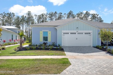 Embrace paradise in this like new Lucia Villa & start living on LPGA International Golf Course in Florida - for sale on GolfHomes.com, golf home, golf lot