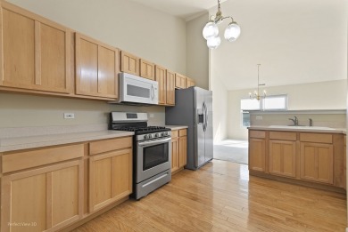 This lovely second floor condo in a secure building features 2 on The Links at Carillon in Illinois - for sale on GolfHomes.com, golf home, golf lot