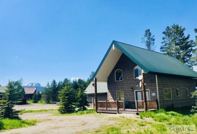 This Attractive Fully Furnished Home has 3 Bedrooms / 3 Baths on Island Park Village Resort Golf Course in Idaho - for sale on GolfHomes.com, golf home, golf lot