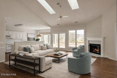 Wake up to shimmering lake views and end your day surrounded by on Tanasi Golf Course in Tennessee - for sale on GolfHomes.com, golf home, golf lot