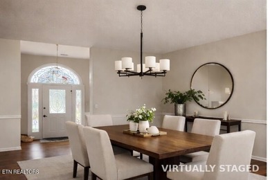 Wake up to shimmering lake views and end your day surrounded by on Tanasi Golf Course in Tennessee - for sale on GolfHomes.com, golf home, golf lot