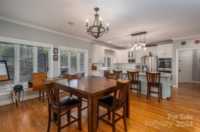 This gorgeous sprawling 1.5 story home is located in the premier on Rock Barn Golf and Spa in North Carolina - for sale on GolfHomes.com, golf home, golf lot