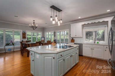 This gorgeous sprawling 1.5 story home is located in the premier on Rock Barn Golf and Spa in North Carolina - for sale on GolfHomes.com, golf home, golf lot