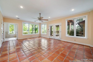 With lovely vistas of the Windcrest golf course, this spacious on Windcrest Golf Club in Texas - for sale on GolfHomes.com, golf home, golf lot