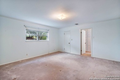 With lovely vistas of the Windcrest golf course, this spacious on Windcrest Golf Club in Texas - for sale on GolfHomes.com, golf home, golf lot