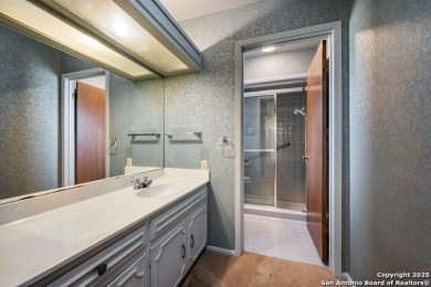 With lovely vistas of the Windcrest golf course, this spacious on Windcrest Golf Club in Texas - for sale on GolfHomes.com, golf home, golf lot