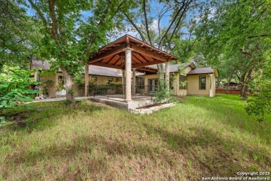 With lovely vistas of the Windcrest golf course, this spacious on Windcrest Golf Club in Texas - for sale on GolfHomes.com, golf home, golf lot