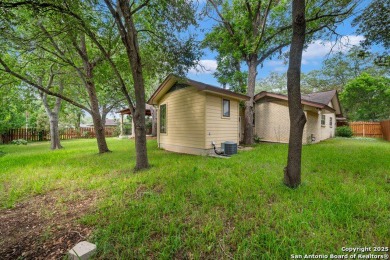 With lovely vistas of the Windcrest golf course, this spacious on Windcrest Golf Club in Texas - for sale on GolfHomes.com, golf home, golf lot