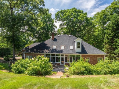 This gorgeous sprawling 1.5 story home is located in the premier on Rock Barn Golf and Spa in North Carolina - for sale on GolfHomes.com, golf home, golf lot