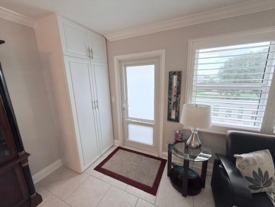 A most desirable waterfront location near pooles beautifully on Hillsboro Pines Golf in Florida - for sale on GolfHomes.com, golf home, golf lot