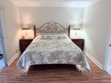 A most desirable waterfront location near pooles beautifully on Hillsboro Pines Golf in Florida - for sale on GolfHomes.com, golf home, golf lot