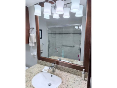 A most desirable waterfront location near pooles beautifully on Hillsboro Pines Golf in Florida - for sale on GolfHomes.com, golf home, golf lot