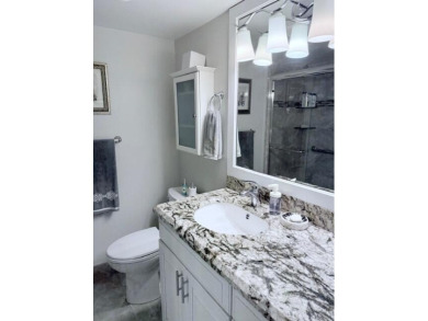 A most desirable waterfront location near pooles beautifully on Hillsboro Pines Golf in Florida - for sale on GolfHomes.com, golf home, golf lot