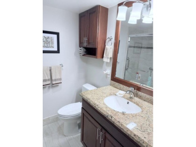 A most desirable waterfront location near pooles beautifully on Hillsboro Pines Golf in Florida - for sale on GolfHomes.com, golf home, golf lot