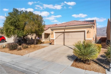 Welcome home to this Charming Heather Model in Sun City Aliante on Aliante Golf Club in Nevada - for sale on GolfHomes.com, golf home, golf lot