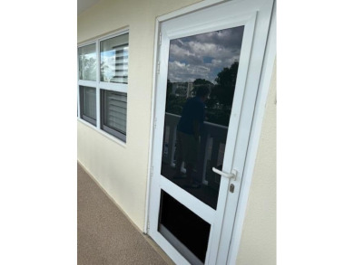 A most desirable waterfront location near pooles beautifully on Hillsboro Pines Golf in Florida - for sale on GolfHomes.com, golf home, golf lot