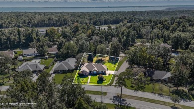 Beautiful 3-Bedroom, 2-Bath Home on Half-Acre Corner Lot in on Diamondhead Country Club in Mississippi - for sale on GolfHomes.com, golf home, golf lot