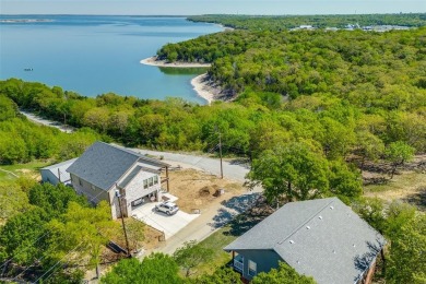 Experience lakeside luxury with this one-of-a-kind property on Tanglewood Resort in Texas - for sale on GolfHomes.com, golf home, golf lot