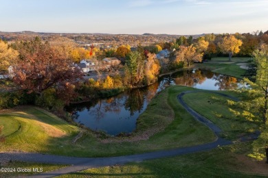 This beautifully maintained 4-bedroom, 2.5-bath single-family on Wolferts Roost Country Club in New York - for sale on GolfHomes.com, golf home, golf lot