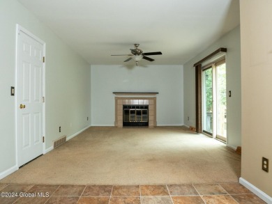 This beautifully maintained 4-bedroom, 2.5-bath single-family on Wolferts Roost Country Club in New York - for sale on GolfHomes.com, golf home, golf lot