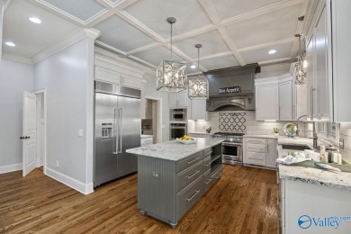 Exceptional luxury living in this stunning 5-bedroom, 7-bath on Hampton Cove Golf Course in Alabama - for sale on GolfHomes.com, golf home, golf lot