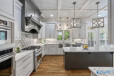 Exceptional luxury living in this stunning 5-bedroom, 7-bath on Hampton Cove Golf Course in Alabama - for sale on GolfHomes.com, golf home, golf lot