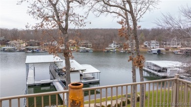 Discover the ultimate lakefront lifestyle in this stunning home on The Club At Porto Cima in Missouri - for sale on GolfHomes.com, golf home, golf lot