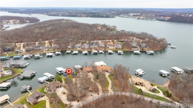 Discover the ultimate lakefront lifestyle in this stunning home on The Club At Porto Cima in Missouri - for sale on GolfHomes.com, golf home, golf lot