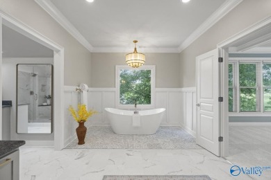 Exceptional luxury living in this stunning 5-bedroom, 7-bath on Hampton Cove Golf Course in Alabama - for sale on GolfHomes.com, golf home, golf lot