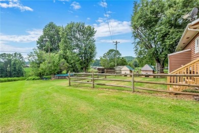 Charming MOVE IN READY ranch style home with a POOL close to on Rock Creek Country Club in North Carolina - for sale on GolfHomes.com, golf home, golf lot