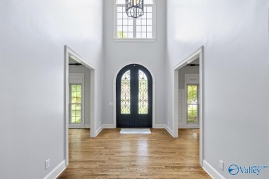 Exceptional luxury living in this stunning 5-bedroom, 7-bath on Hampton Cove Golf Course in Alabama - for sale on GolfHomes.com, golf home, golf lot