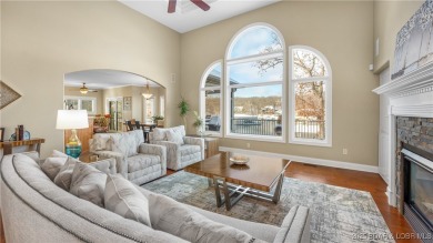 Discover the ultimate lakefront lifestyle in this stunning home on The Club At Porto Cima in Missouri - for sale on GolfHomes.com, golf home, golf lot