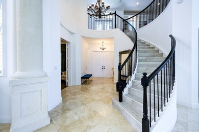 Live luxuriously on the 16th green of the Arnold Palmer on Frenchmans Reserve in Florida - for sale on GolfHomes.com, golf home, golf lot