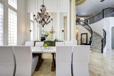 Live luxuriously on the 16th green of the Arnold Palmer on Frenchmans Reserve in Florida - for sale on GolfHomes.com, golf home, golf lot