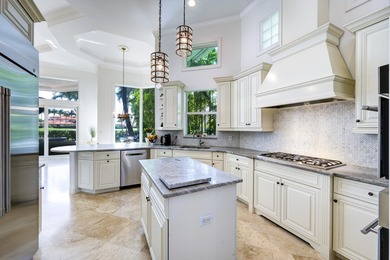 Live luxuriously on the 16th green of the Arnold Palmer on Frenchmans Reserve in Florida - for sale on GolfHomes.com, golf home, golf lot