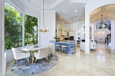 Live luxuriously on the 16th green of the Arnold Palmer on Frenchmans Reserve in Florida - for sale on GolfHomes.com, golf home, golf lot