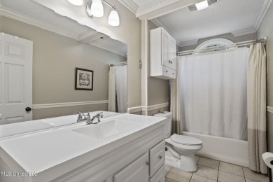 This mid-century modern home has been tastefully updated while on Colonial Country Club Deerfield in Mississippi - for sale on GolfHomes.com, golf home, golf lot