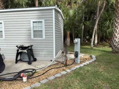 Nicely shaded Oak Cove Road RV property, including a storage on The Great Outdoors Golf and Country Club in Florida - for sale on GolfHomes.com, golf home, golf lot
