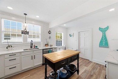 Dream home alert! This stunning 5 bedroom 3 1/2 bath Colonial on Clearwater Country Club in Florida - for sale on GolfHomes.com, golf home, golf lot